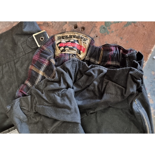 131 - A Belstaff wax jacket, size 44, together with a pair of Trail Master trousers, size 30 and two pairs... 