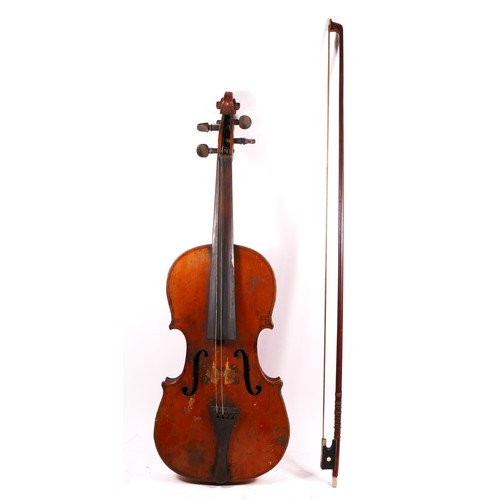 231 - A German made violin, labelled internally with “made in Germany”, two bridges, together with a unbra... 