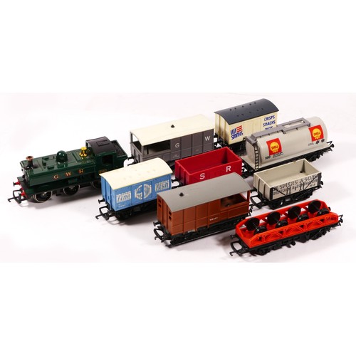 65 - A collection of unbranded OO gauge locos and wagons to include a G.W.R 8751 loco, in G.W.R. green li... 