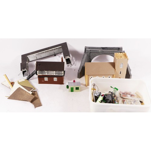 71 - A substantial collection of scratch built buildings for a model railway including signal boxes, hous... 