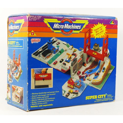 74 - A Micro Machines Super City Toolbox including bridge and airport runway, original box