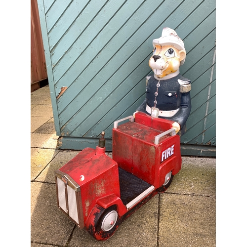 78 - A Whittaker Bros fairground ride, in the form of a fire engine with a anthropomorphized beaver as a ... 