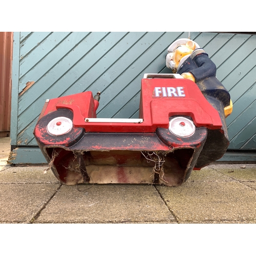 78 - A Whittaker Bros fairground ride, in the form of a fire engine with a anthropomorphized beaver as a ... 