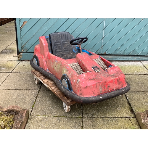 79 - A fairground ride vehicle in the form of a sports car, with applied Rover badge, with bumper car sty... 