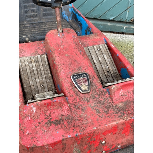 79 - A fairground ride vehicle in the form of a sports car, with applied Rover badge, with bumper car sty... 