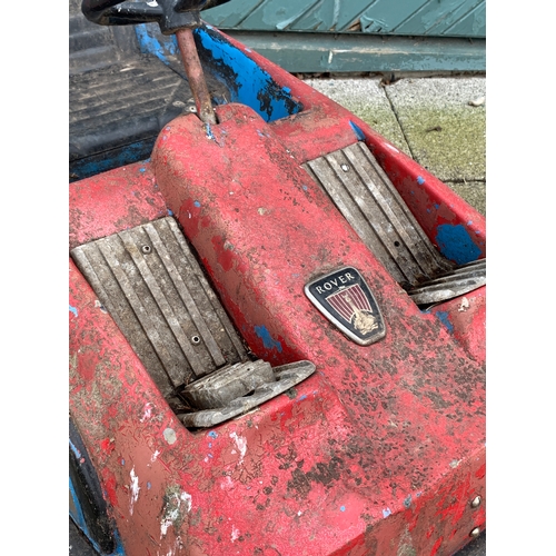 79 - A fairground ride vehicle in the form of a sports car, with applied Rover badge, with bumper car sty... 