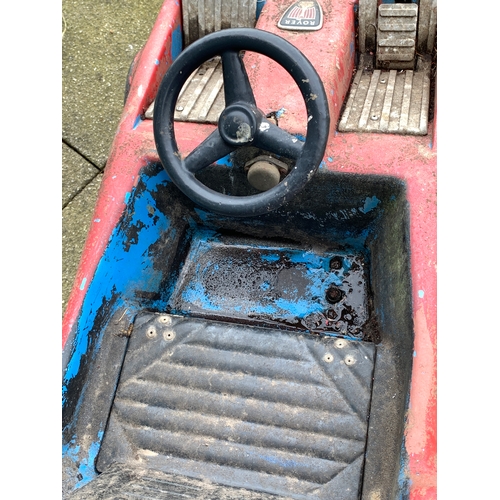 79 - A fairground ride vehicle in the form of a sports car, with applied Rover badge, with bumper car sty... 