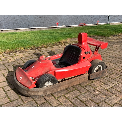 80 - A fairground ride vehicle in the form of a Formula 1 car, with hinged rear spoiler, opens to reveal ... 