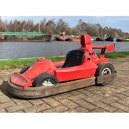 80 - A fairground ride vehicle in the form of a Formula 1 car, with hinged rear spoiler, opens to reveal ... 