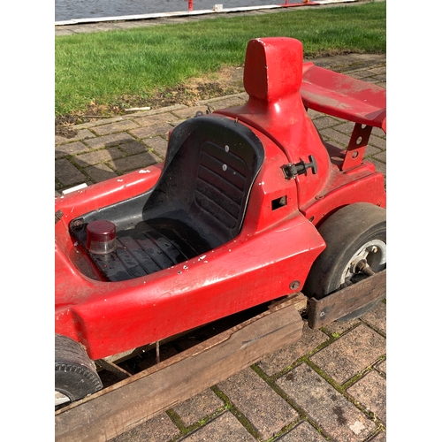 80 - A fairground ride vehicle in the form of a Formula 1 car, with hinged rear spoiler, opens to reveal ... 