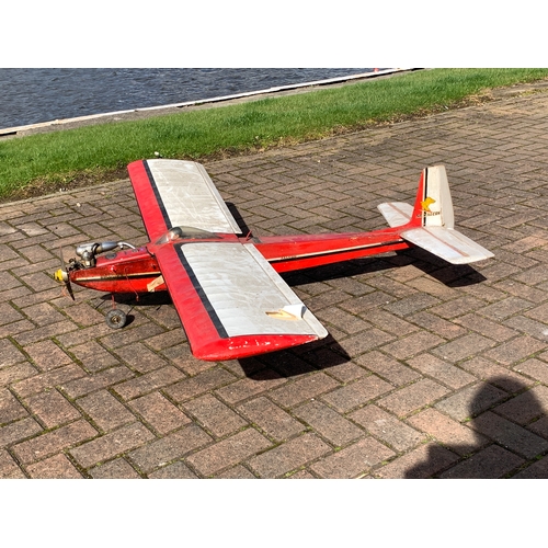 84 - A radio controlled model plane with an Irvine 40 engine, removable wings reveal servos, with model p... 