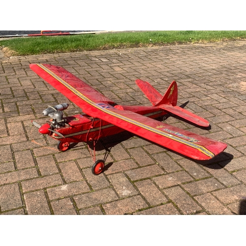 85 - A radio controlled model plane with a MDS 40 engine, removable wings open to reveal servos decorated... 