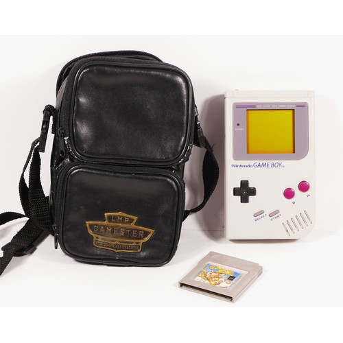 109 - A Nintendo Game Boy, model No DMG-01 (serial No G25114611), together with a LMP Gamester carry case,... 