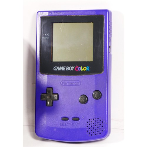 111 - A Nintendo Game Boy Color, in purple/grape colourway, model No CGB-001 (serial No CG100008852), toge... 