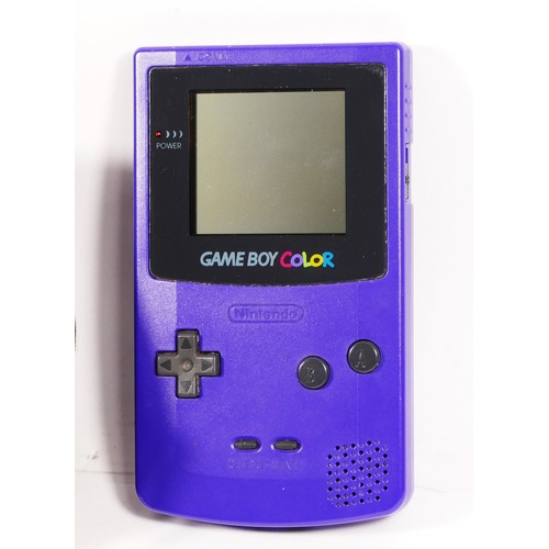 A Nintendo Game Boy Color, in purple/grape colourway, model No CGB 