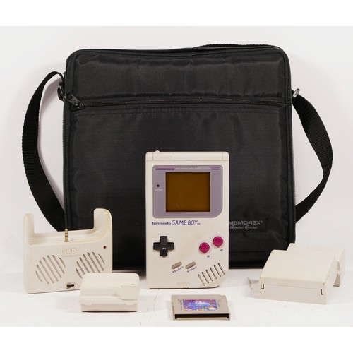 113 - A Nintendo Game Boy, model No DMG-01 (serial No G19740910), together with a Memorex carry case, with... 