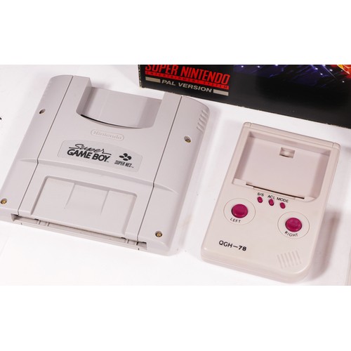 115 - A collection of Nintendo Game Boy and SNES related handhelds and accessories, two Super Game Boy car... 