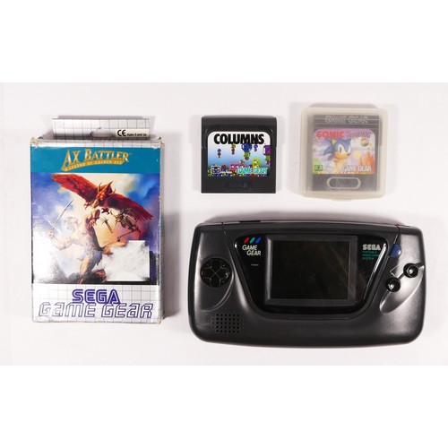 123 - A Sega Game Gear hand held console (missing one battery cover), together with Ax Battler A Legend Of... 