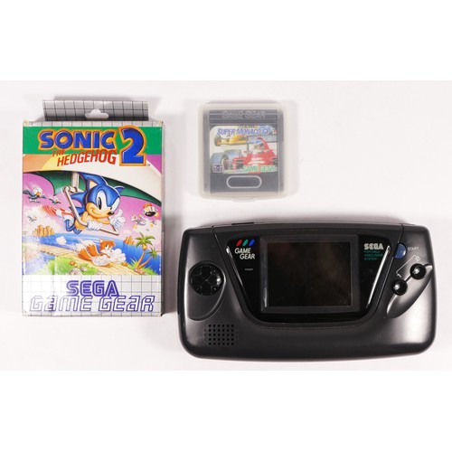 124 - A Sega Game Gear hand held console (serial No B31062104), together with Sonic The Hedgehog 2, boxed ... 