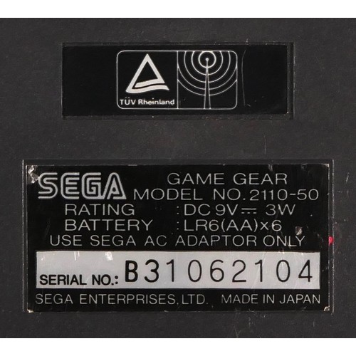 124 - A Sega Game Gear hand held console (serial No B31062104), together with Sonic The Hedgehog 2, boxed ... 