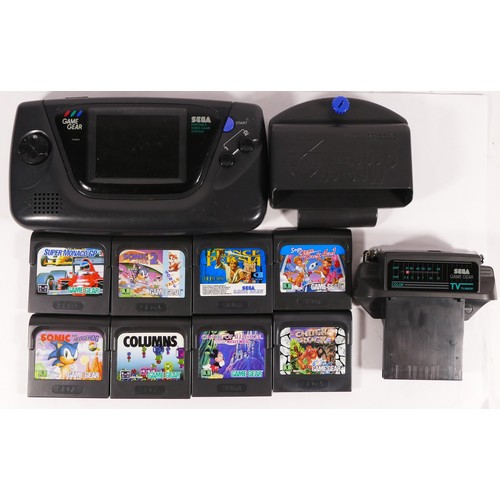 127 - A Sega Game Gear hand held console (serial No P31233126), for spares or repairs, together with a Mas... 