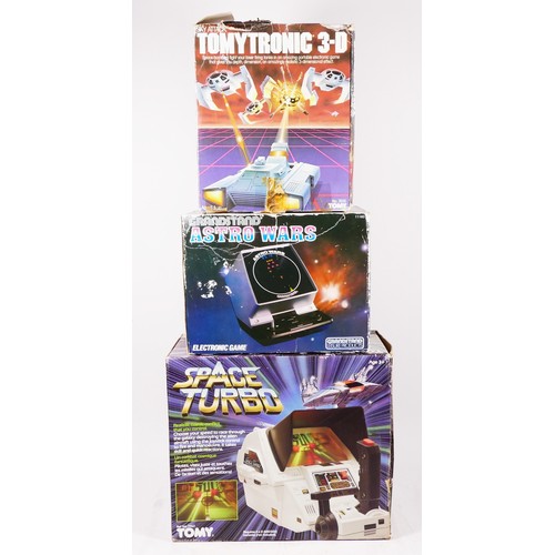 136 - Three electronic table top/handheld games, to include, Astro Wars, by Grandstand, boxed, Sky Attack ... 