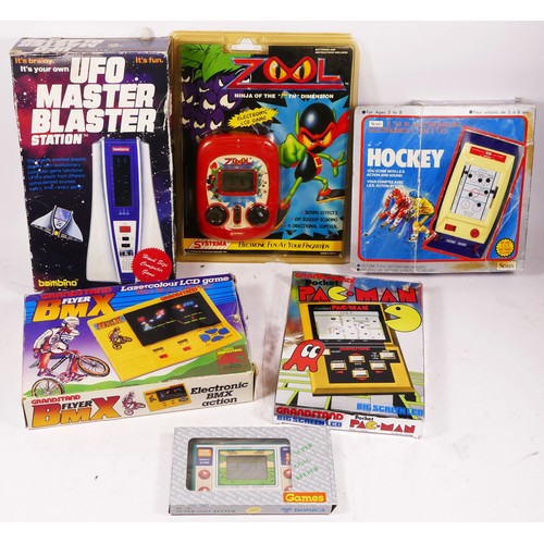 137 - Six boxed handheld electronic games, to include Super Gaol Keeper, by Tronica, Pocket Pac Man, by Gr... 