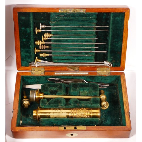 157 - A Arnold & Son hypodermic syringe, brass, with embossed makers seal, together with a collection of i... 