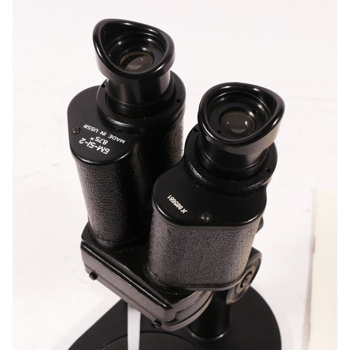 162 - A Binocular microscope, Russian made, stamped BM-5-2 (serial No 885681), together with manual