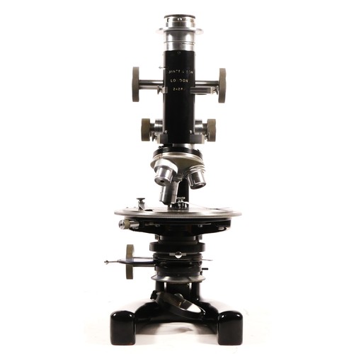 163 - A J. Swift & Sons microscope, stamped with makers name 24286, with chromed coarse wheels, 33cm tall