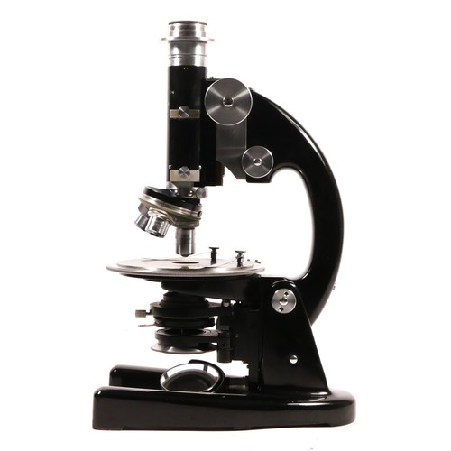 163 - A J. Swift & Sons microscope, stamped with makers name 24286, with chromed coarse wheels, 33cm tall