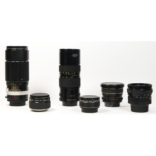 171 - Four manual camera lens, to include a Hellios 85mm-210mm f3.8, a Soligor 200mm f3.5, a Sigma XQ 28mm... 