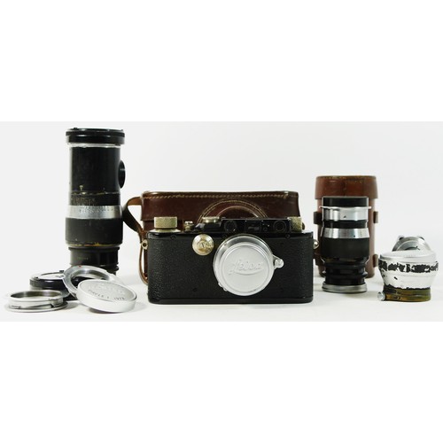 173 - A Leica III D.R.P Ernst Leitz Wetzlar 35mm camera, black (serial No 185240), 1936, together with a E... 