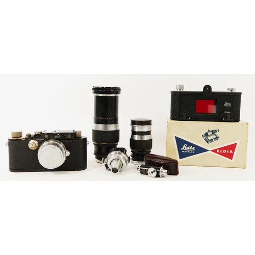 173 - A Leica III D.R.P Ernst Leitz Wetzlar 35mm camera, black (serial No 185240), 1936, together with a E... 