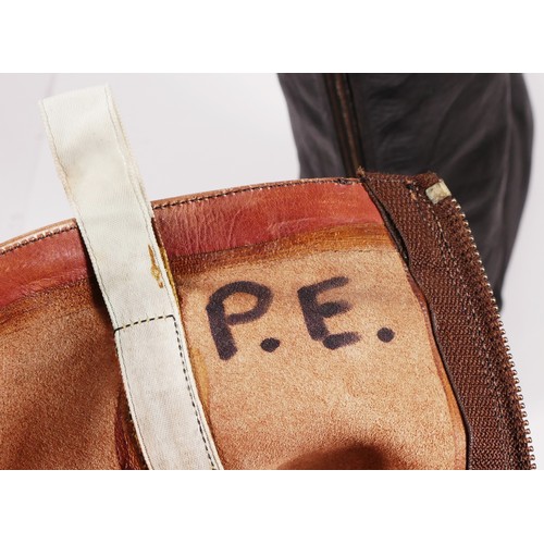 283 - Pat Eddery, a pair of race worn brown and black leather riding boots, initialed P.E. to the inside.
... 