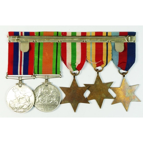 306 - WWII mounted group of five, 1939-1945 Star, Africa Star with 8th Army bar, Italy Star, Defense and W... 