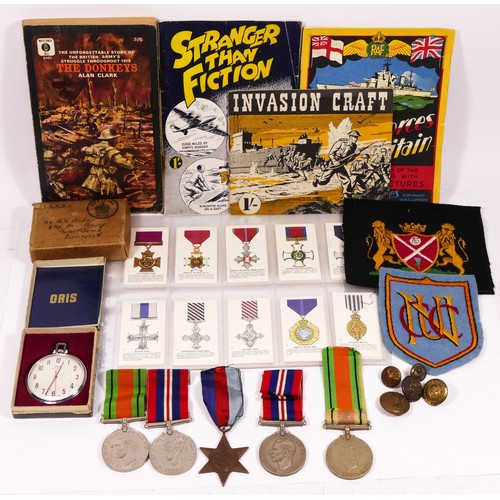 296 - Five WWII medals, 1939 - 1945 Star, two Defense and two War, together with related ephemera.