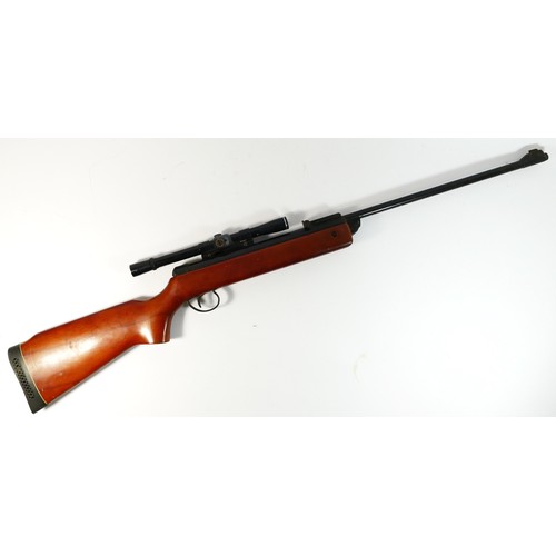 340 - A BSA Guns .22 cal air rifle, stamped T 6525 on hinge, includes BSA 4x20 optic, rubberised butt stoc... 