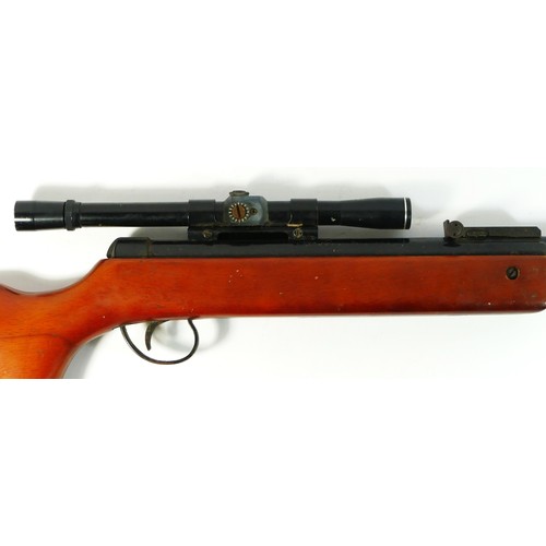 340 - A BSA Guns .22 cal air rifle, stamped T 6525 on hinge, includes BSA 4x20 optic, rubberised butt stoc... 