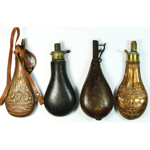 345 - A copper and brass powder flask, unsigned, embossed body, 20cm, two leather examples and a reproduct... 