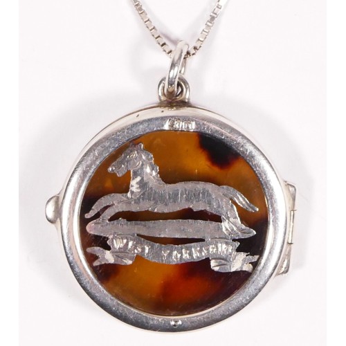 311 - Of West Yorkshire Regiment interest; a WWI sweetheart silver and tortoiseshell locket, London 1915, ... 