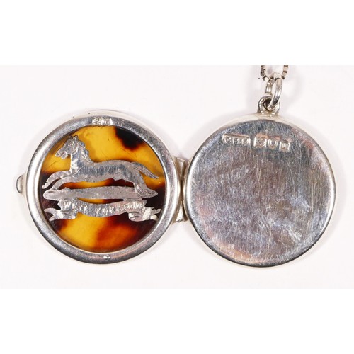 311 - Of West Yorkshire Regiment interest; a WWI sweetheart silver and tortoiseshell locket, London 1915, ... 