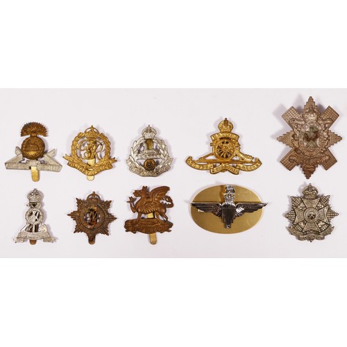 320 - Ten cap badges to include the Parachute Regiment, and Scottish Borderers