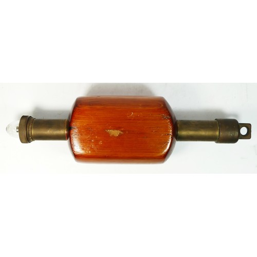 253 - A Easco light buoy, brass rob incased in a buoyant wood, with glass removable cap and bulb, 43cm