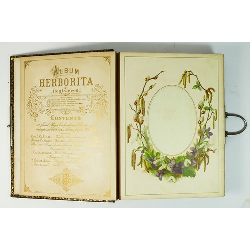 251 - A Victorian tooled Herborita photograph album, with printed floral designs, 30 x 23 x 6cm