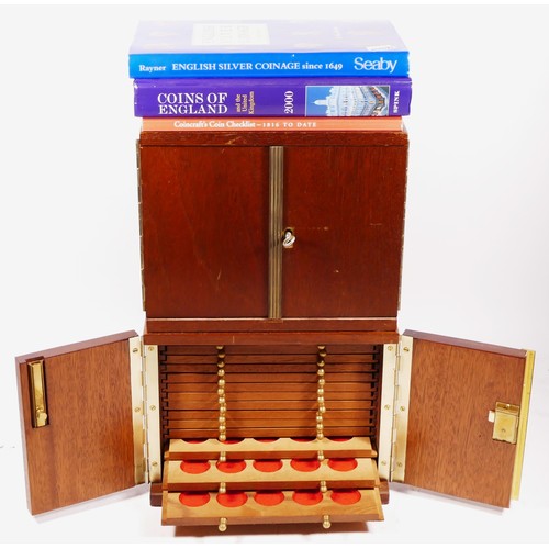 354 - Two coin cabinets, with 14 trays, 21 x 17 x 18cm, and coin books.