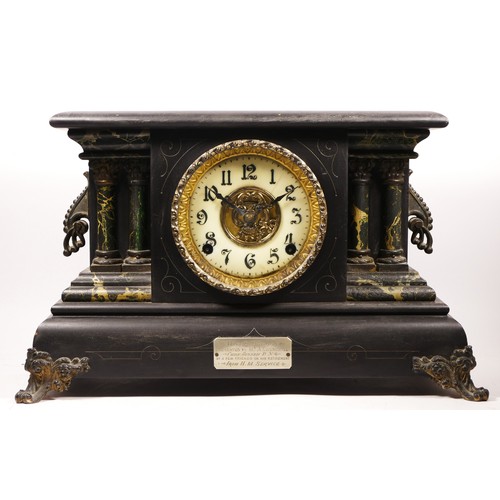 256 - Of HMS Ganges interest; an imitation black slate and marble mantel clock, with presentation plaque, ... 