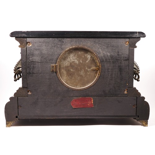 256 - Of HMS Ganges interest; an imitation black slate and marble mantel clock, with presentation plaque, ... 