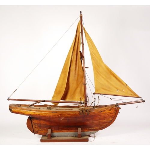 261 - Two model boats, wooden hull and masts, fabric sails, intended for decoration, 72cm x 82cm (largest)