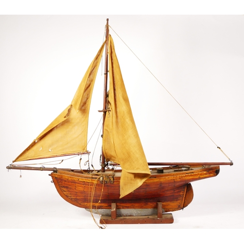 261 - Two model boats, wooden hull and masts, fabric sails, intended for decoration, 72cm x 82cm (largest)